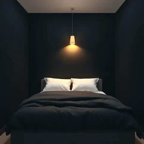 Czarną ścianą w małej sypialni